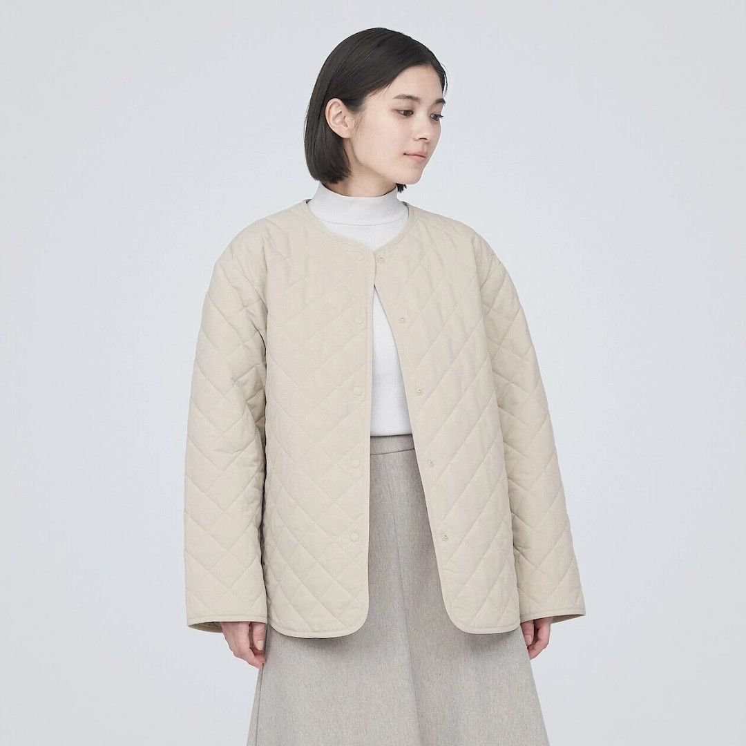 Muji Padded Quilted Jacket (Category: Coats, Jackets and Outerwear) located in San Juan City. Submitted by marie_d_r (Listing ID 1467510972, Image 1). Description: - Color: Versatile beige - Size: Medium (M) - Style: Lightweight quilted jacket with front button closures - Design: Long sleeves and classic round neckline - Condition: Clean, no noticeable marks or wear - Easy to pair with any outfit.