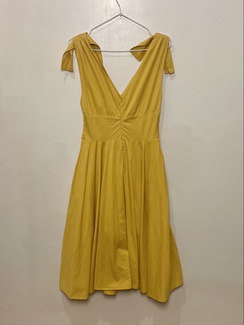 Mustard Yellow Ruched Dress (Category: Dresses) located in Pasig City. Submitted by againdarling (Listing ID 1467474068, Image 2). Description: S-M Bust up to 34 Waist 26-28 .