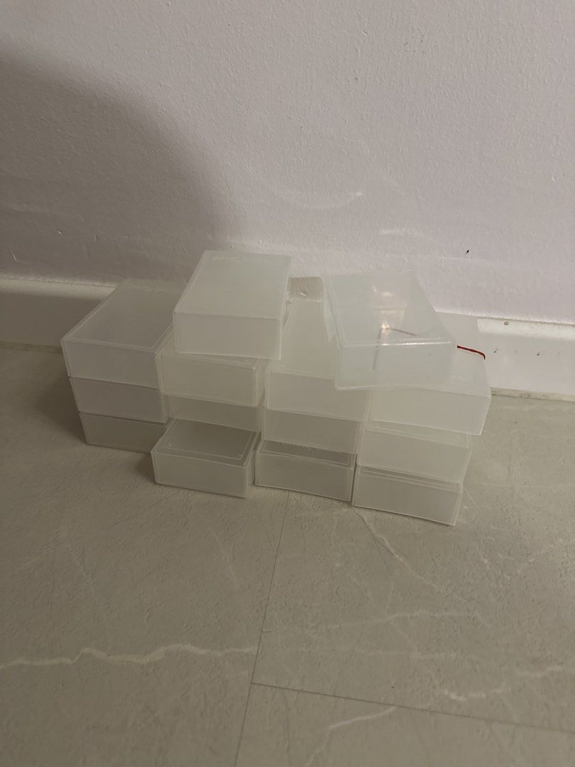 Namecard Boxes (Category: Storage Boxes & Baskets) located in Singapore. Submitted by kerxx (Listing ID 1467427975, Image 1). Description: - Semi-transparent clear plastic boxes with lids - Easily see what's inside at a glance - Rectangular shape, perfect for desks and drawers - Ideal for stationery, craft supplies, and small items (made for name cards) - Sturdy and practical build - Multiple pieces available in a stack 14 pc available, self coll