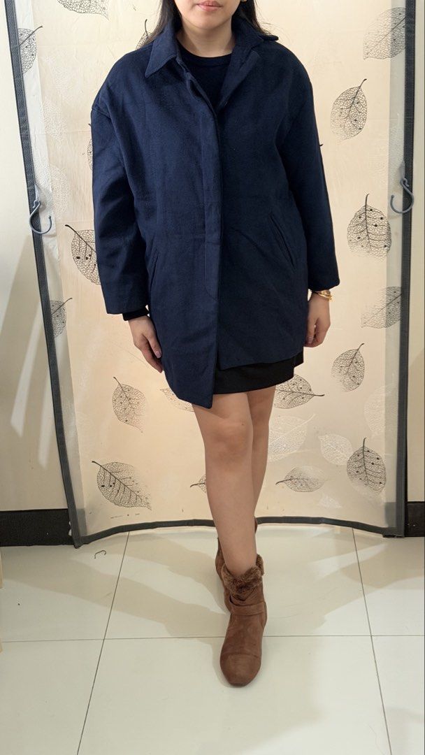 Navy Blue Coat Jacket (Category: Coats, Jackets and Outerwear) located in Paranaque City. Submitted by paupreloveditems (Listing ID 1467452729, Image 3). Description: - Best for Autumn/Winter -Fits L-XL - Color: Classic navy blue - Style: Button-up front with lapel collar - Length: Mid-thigh - Features: Two side pockets, fully lined interior - Condition: Excellent, clean, no flaws noticed.