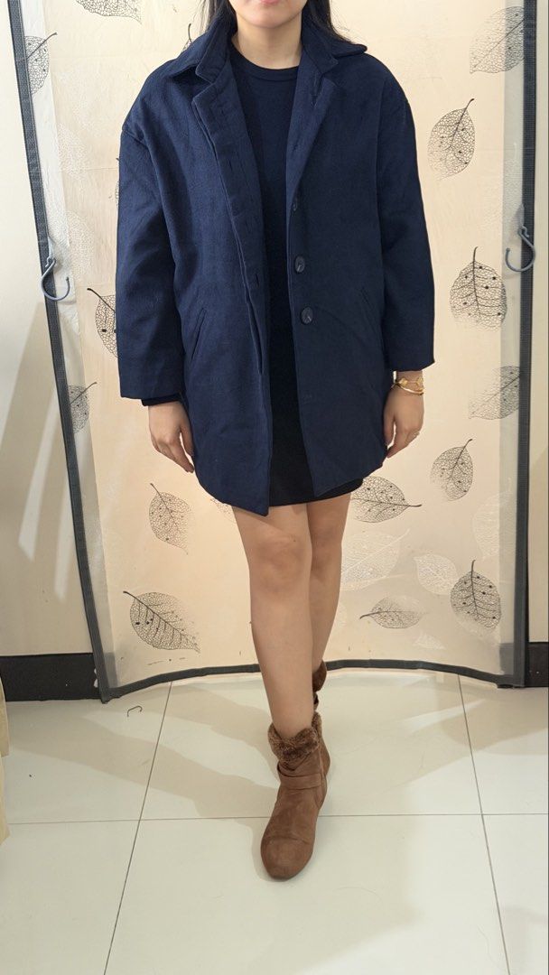 Navy Blue Coat Jacket (Category: Coats, Jackets and Outerwear) located in Paranaque City. Submitted by paupreloveditems (Listing ID 1467452729, Image 2). Description: - Best for Autumn/Winter -Fits L-XL - Color: Classic navy blue - Style: Button-up front with lapel collar - Length: Mid-thigh - Features: Two side pockets, fully lined interior - Condition: Excellent, clean, no flaws noticed.