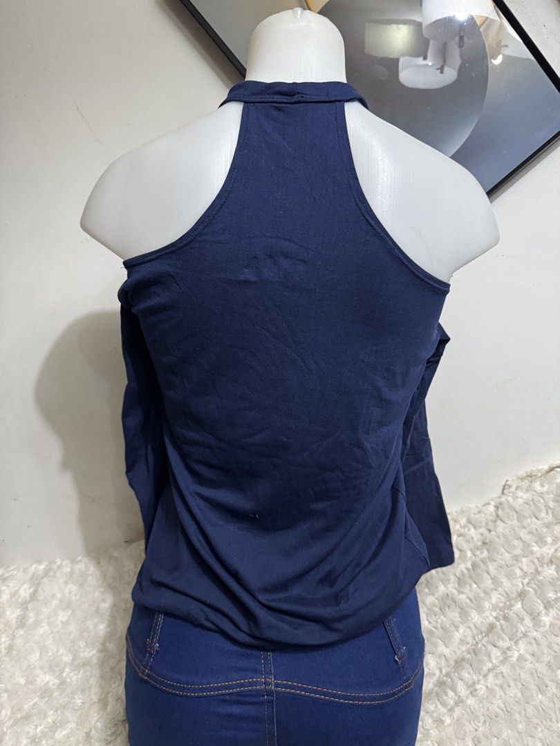 Navy Blue Cold Shoulder Long Sleeve Mock Neck Top (Category: Longsleeves) located in Marikina City. Submitted by lorradel (Listing ID 1467503619, Image 3). Description: - fits S-M - Color: Dark blue - Design: Cold shoulder cutouts with mock neck and front keyhole - Fit: Soft, stretchy fabric that hugs the body - Styling: Easily pairs with high-waisted jeans or shorts - MAY HAVE some washable stains (hindi maiiwasan) needs washing; had been stored