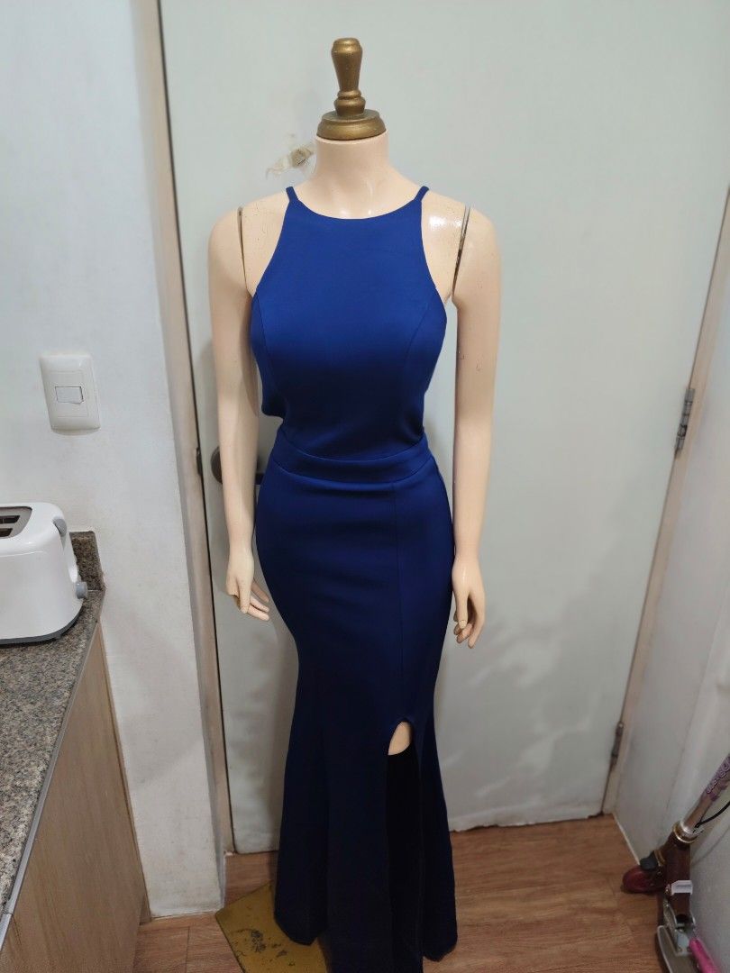 Navy Blue Mermaid Cut Gown (Category: Dresses) located in Manila. Submitted by deleonhann57311 (Listing ID 1467420043, Image 3). Description: Fits extra small to Small only Zipper Back Built in foam stretchable. Very Good Quality.