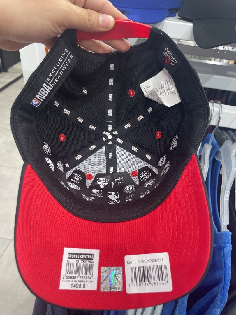 NBA Chicago Bulls Snapback Cap Black Red (Category: Caps & Hats) located in Caloocan City. Submitted by addtojoyonlinestore (Listing ID 1467515708, Image 2). Description: - Brand: NBA Authentic Headwear (Chicago Bulls) - Condition: Brand new with store tags attached, never worn - Color: Black body with red brim and top button - Details: Embroidered front team logo, side Bulls lettering, and interior branding tapes - Authenticity: NBA hologram sti