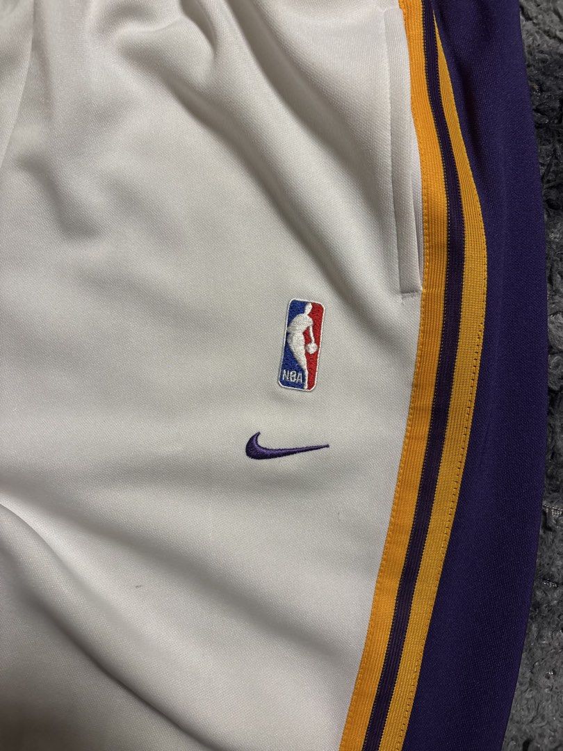 NBA LAKERS 90'S WARMERS (Category: Joggers) located in Manila. Submitted by aeronmaurcio (Listing ID 1467417732, Image 3). Description: NBA LAKERS 90'S WARMERS VINTAGE PIECE LIKE NEW HAS BUTTONS NEAR LEG OPENING W- 27 TO 40 THIGH- 12.5 L- 42.5 LEG OPENING- 7.5.