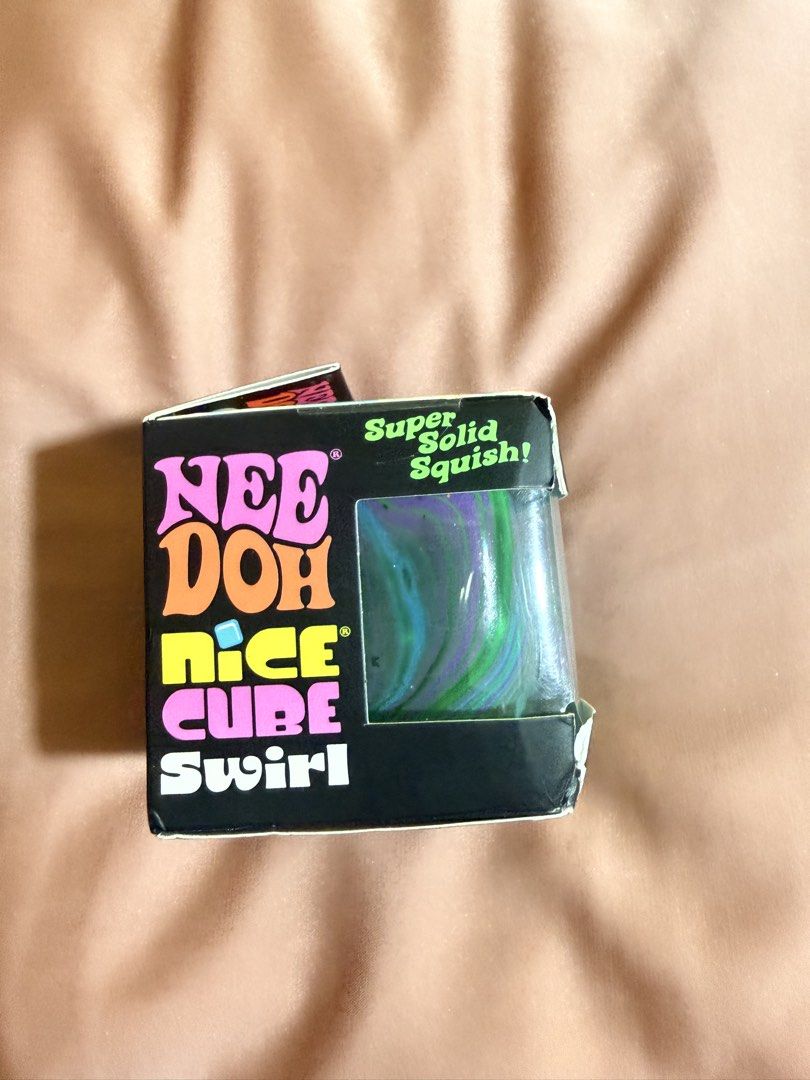 Needoh Nice Cube Swirl (Authentic from Amazon) (Category: Kids Toys) located in Pasig City. Submitted by cacishop (Listing ID 1467431766, Image 2). Description: Color: Blue/Green/Purple Bought from Amazon Schylling shop Never Opened Final Price (pls see original price posted in the last slide) no haggling RFS: Color (We wanted the pink and purple one).