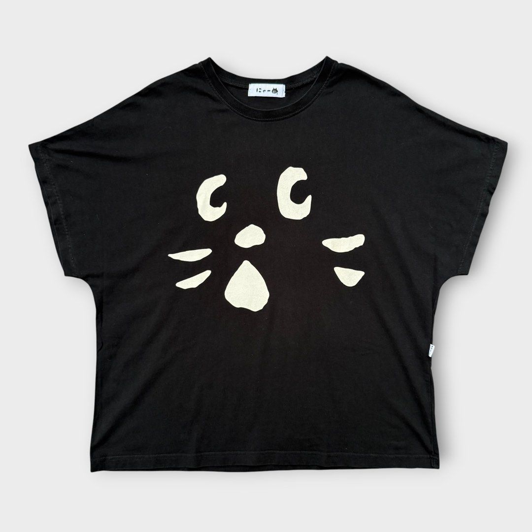 Ne-net - NYA Cat Big Face Oversized Blouse (Category: Blouses) located in Los Banos. Submitted by declutterking (Listing ID 1467576072, Image 1). Description: Size Medium on tag Dimensions: 23.75" chest 27" length 12.75" sleeves (from neck) Good as new condition Authentic.