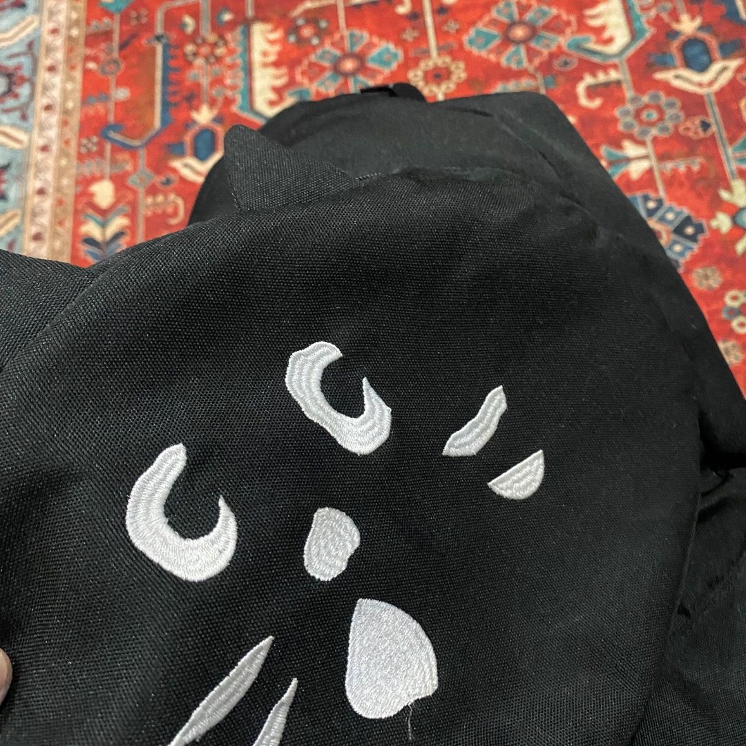 Ne-net x Issey Miyake Backpack (Category: Backpacks) located in Antipolo. Submitted by bentakahitanoano (Listing ID 1467487822, Image 3). Description: Ne-net "Nya" Black Cat 2-Way Backpack, an archival gem heavily sought after in Japanese streetwear and archive fashion communities Ne-net, designed by Kazuaki Takashima under the Issey Miyake group, is famous for its whimsical, quirky characters, and "Nya" the black cat is the brand’s most iconic m