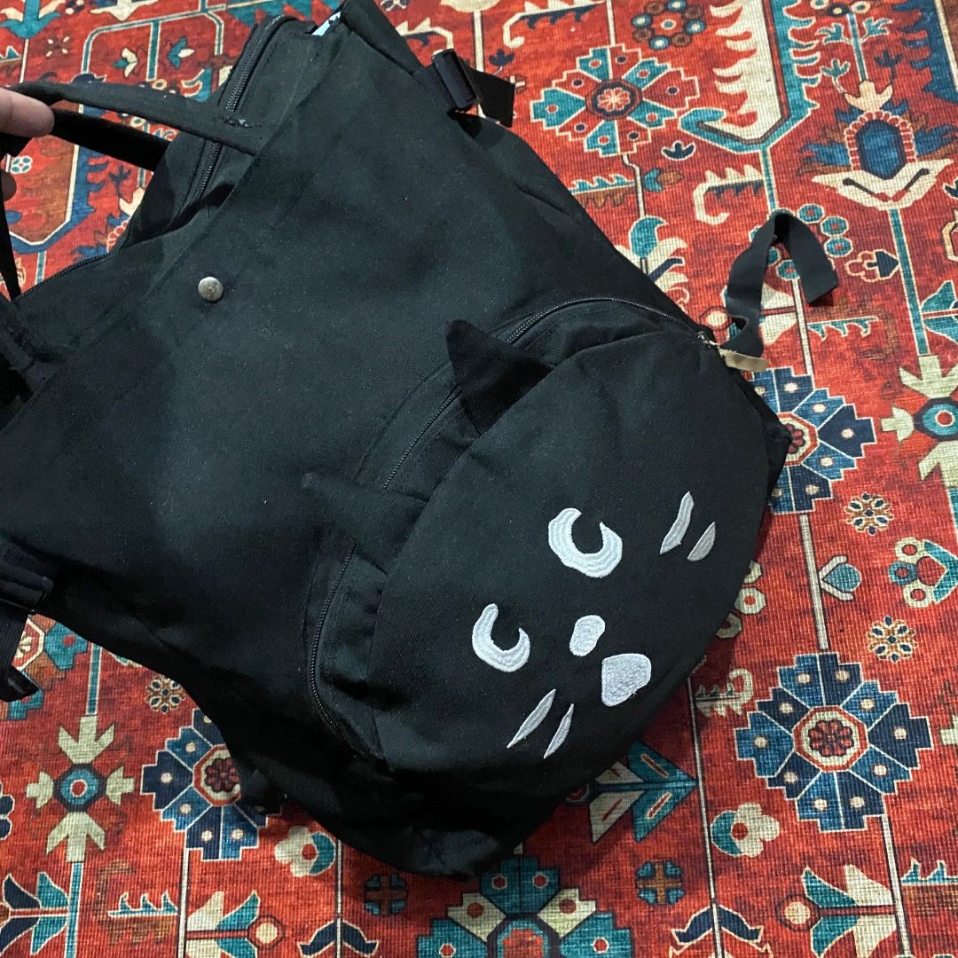 Ne-net x Issey Miyake Backpack (Category: Backpacks) located in Antipolo. Submitted by bentakahitanoano (Listing ID 1467487822, Image 2). Description: Ne-net "Nya" Black Cat 2-Way Backpack, an archival gem heavily sought after in Japanese streetwear and archive fashion communities Ne-net, designed by Kazuaki Takashima under the Issey Miyake group, is famous for its whimsical, quirky characters, and "Nya" the black cat is the brand’s most iconic m