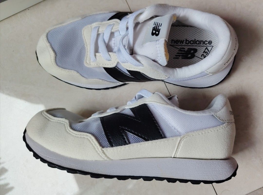 New Balance 237 White US13 18.5cm (Category: Babies & Kids Fashion) located in Quezon City. Submitted by waemierrie (Listing ID 1467476629, Image 1). Description: Original NB 237 Kids Us13 13.5cm Like new!! Features light colored nylon/mesh panels can look slightly transparent or see through (colored or patterned socks can show through the fabric) New Balance 237 sneakers in white and black. Mesh upper with suede overlays and classic 'N' logo on 