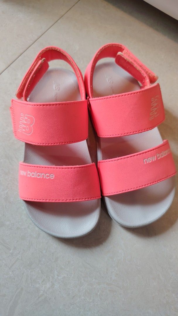 New Balance Pink Sandals 20cm (Category: Babies & Kids Fashion) located in Quezon City. Submitted by waemierrie (Listing ID 1467466435, Image 3). Description: Original NB sandals Made in Korea 20cm Bright pink New Balance sandals with velcro straps. Grey contoured footbed for comfort. Two strap design with branding on the upper strap and heel strap. Easy to put on and take off. Great footwear for casual everyday wear during warmer months..