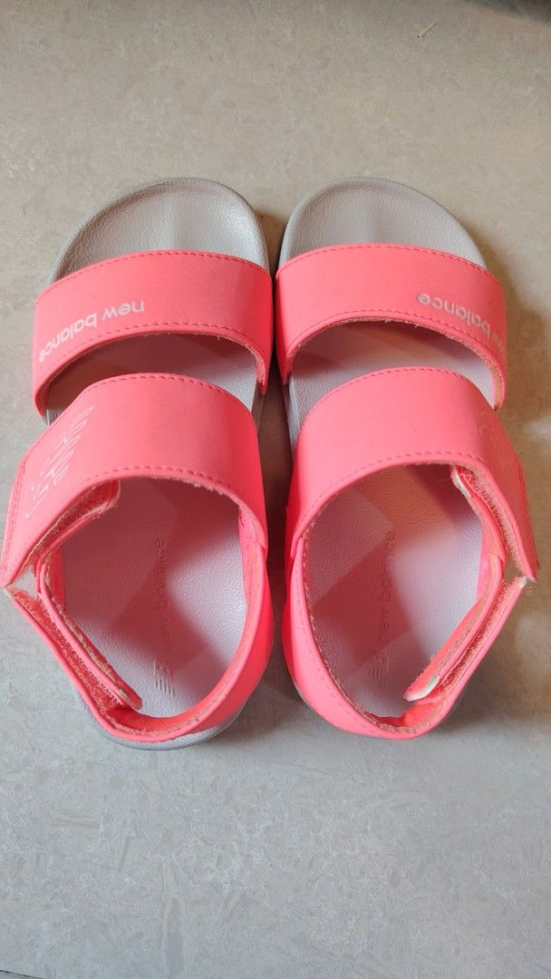 New Balance Pink Sandals 20cm (Category: Babies & Kids Fashion) located in Quezon City. Submitted by waemierrie (Listing ID 1467466435, Image 2). Description: Original NB sandals Made in Korea 20cm Bright pink New Balance sandals with velcro straps. Grey contoured footbed for comfort. Two strap design with branding on the upper strap and heel strap. Easy to put on and take off. Great footwear for casual everyday wear during warmer months..