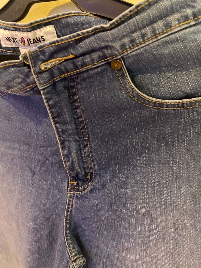 Next Jeans Blue Denim Medium (Category: Jeans) located in Quezon City. Submitted by ultra_seller (Listing ID 1467373193, Image 3). Description: Brand: NEXT Jeans Size: EU 38 / US 6 Color: Medium blue denim with faded detailing Cut: Appears to be bootcut or slightly flared Hems: Finished, with some unevenness in how the legs hang Details: Branded metal button, zipper fly and decorative back-pocket stitching Overall condition: 7.5/10.