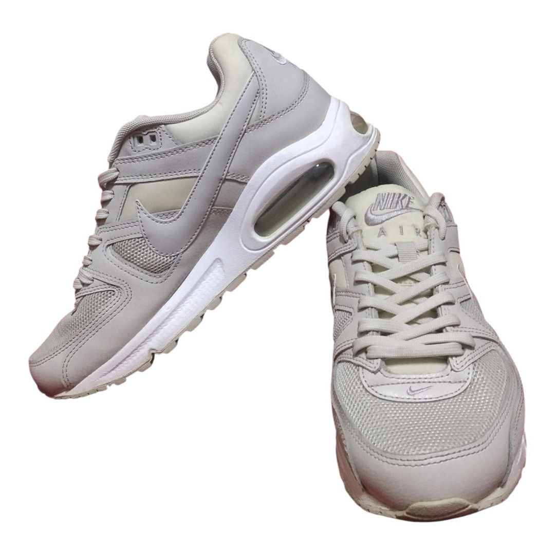 Nike Air Max Command Light Grey Sneakers (Category: Sneakers) located in Baliuag. Submitted by Bacon (Listing ID 1467387687, Image 1). Description: - Brand/Model: Nike Air Max Command - Colorway: Neutral Grey and White - Size: US 7.5 / UK 5 / EUR 38.5 (24.5 cm) - Materials: Mesh upper with durable leather overlays - Features: Visible Air unit in the heel for cushioning, signature waffle rubber outsole - Condition: Light dirt on soles. Used a few 