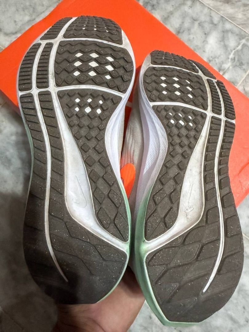 Nike Air Zoom Pegasus 39 PRM (Category: Sneakers) located in Muntinlupa City. Submitted by bapperty_2026 (Listing ID 1467414491, Image 2). Description: - Nike Air Zoom Pegasus 39 PRM - Women's sneakers - Color: Photon Dust/Mint Foam - Size: US 6 / UK 3.5 / EUR 36.5 - Comes with original box - Orange accents.