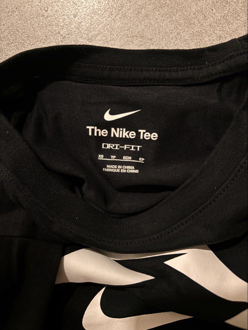 Nike Black Tee - hiking shirt (Category: Activewear) located in Manila. Submitted by nicoleaaa (Listing ID 1467457582, Image 3). Description: - Brand: Nike - Color: Black with white mountain & swoosh graphic - Fit: Standard fit, short sleeve, regular crew neck - Material: Soft cotton feel for everyday comfort - Length: Approx. 24 inches (see flat-lay photo) - Condition: Excellent casual daily wear piece.