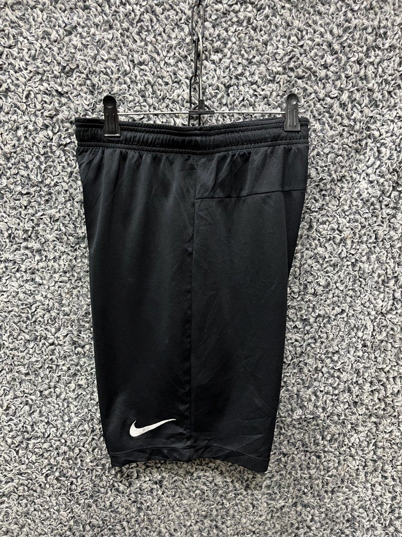 Nike Dri-FIT athletic shorts. | Size S (Category: Shorts) located in General Trias. Submitted by zrchustle.604 (Listing ID 1467494445, Image 1). Description: Nike Dri-FIT athletic shorts. They feature an elastic waistband, lightweight moisture-wicking fabric, the "DRI-FIT" heat-sealed branding on the back hip, and a classic embroidered white Nike Swoosh logo on the lower left leg..