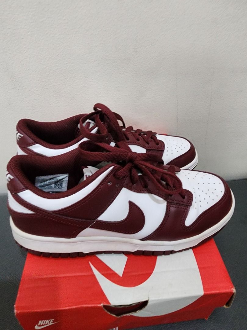 Nike Dunk Low Retro Team Red Burgundy White (Category: Sneakers) located in Quezon City. Submitted by deesell.1907 (Listing ID 1467408230, Image 3). Description: - Model: Nike Dunk Low - Colorway: Team Red / White (Deep burgundy overlays with crisp white leather bases) - Style: Classic low-top skate and streetwear design - Features: Perforated toe box, iconic swoosh branding, and matching red laces - Inclusions: Comes with original orange Nike sh
