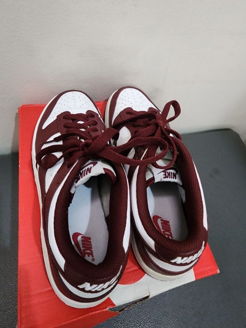Nike Dunk Low Retro Team Red Burgundy White (Category: Sneakers) located in Quezon City. Submitted by deesell.1907 (Listing ID 1467408230, Image 2). Description: - Model: Nike Dunk Low - Colorway: Team Red / White (Deep burgundy overlays with crisp white leather bases) - Style: Classic low-top skate and streetwear design - Features: Perforated toe box, iconic swoosh branding, and matching red laces - Inclusions: Comes with original orange Nike sh