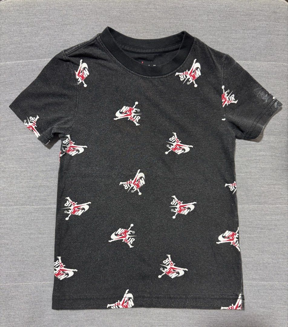 Nike Jordan T-Shirt (Category: Babies & Kids Fashion) located in Rizal. Submitted by preloovved (Listing ID 1467497149, Image 1). Description: Jordan kids black t-shirt with red and white all-over graphic print. Size regular fit, crew neck, cotton blend. Gently used with minimal wash fade. Great daily wear for young ballers! Preloved, 4yo Meet-up only in GB1 San Mateo, Rizal Shipping fee c/o buyer. Tres Marias or J&T express Payment to be sent to