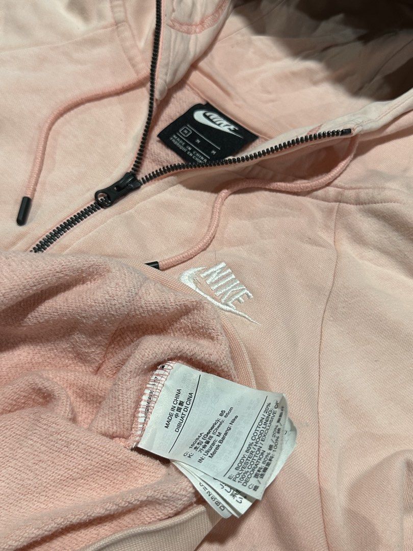 Nike Pink Full Zip Hoodie Size M (Category: Coats, Jackets and Outerwear) located in La Trinidad. Submitted by christian_dutch (Listing ID 1467566249, Image 3). Description: - Brand/Style: Nike Full-Zip Hoodie - Color: Soft Pink with white embroidered chest logo - Size: M - Material: Comfortable cotton blend, ideal for daily wear - Features: Front pockets and matching drawstring hood - Condition: Clean, excellent overall condition with a smoothly
