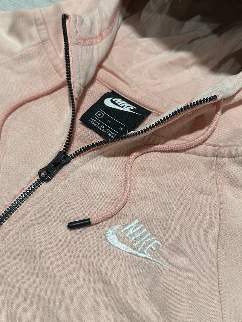 Nike Pink Full Zip Hoodie Size M (Category: Coats, Jackets and Outerwear) located in La Trinidad. Submitted by christian_dutch (Listing ID 1467566249, Image 2). Description: - Brand/Style: Nike Full-Zip Hoodie - Color: Soft Pink with white embroidered chest logo - Size: M - Material: Comfortable cotton blend, ideal for daily wear - Features: Front pockets and matching drawstring hood - Condition: Clean, excellent overall condition with a smoothly