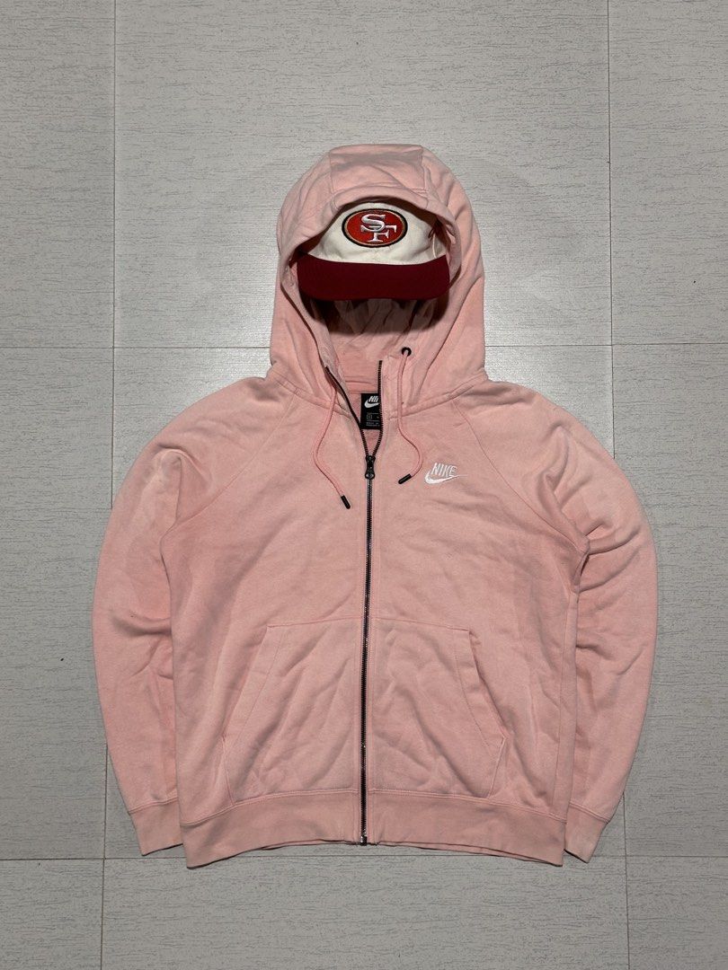 Nike Pink Full Zip Hoodie Size M (Category: Coats, Jackets and Outerwear) located in La Trinidad. Submitted by christian_dutch (Listing ID 1467566249, Image 1). Description: - Brand/Style: Nike Full-Zip Hoodie - Color: Soft Pink with white embroidered chest logo - Size: M - Material: Comfortable cotton blend, ideal for daily wear - Features: Front pockets and matching drawstring hood - Condition: Clean, excellent overall condition with a smoothly