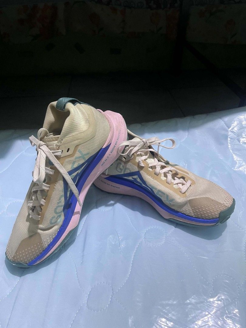 Nike React Pegasus Trail 4 GORE-TEX Women's (Category: Sneakers) located in Dasmarinas. Submitted by preloved_japan_items (Listing ID 1467524824, Image 2). Description: - Brand/Model: Nike React Pegasus Trail 4 GORE-TEX (Women's) - Colorway: Beige and pink with blue accents - Size: US 5 / EUR 35.5 can fit sa size 36 - Features: Waterproof GORE-TEX upper & plush React foam midsole - Condition: Lightly worn, clean treads and uppers - Best for: Trai