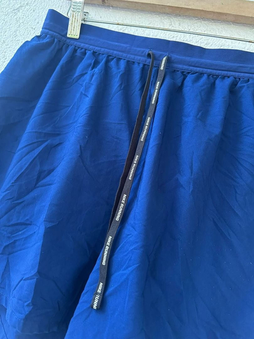 NIKE RUNNING SHORT (Category: Shorts) located in Caloocan City. Submitted by vntgxlocalsph (Listing ID 1467482604, Image 3). Description: ISSUE : MIN LINTS / TINANGGAL YUNG INNER LAYER DIMES : 31x25x14.