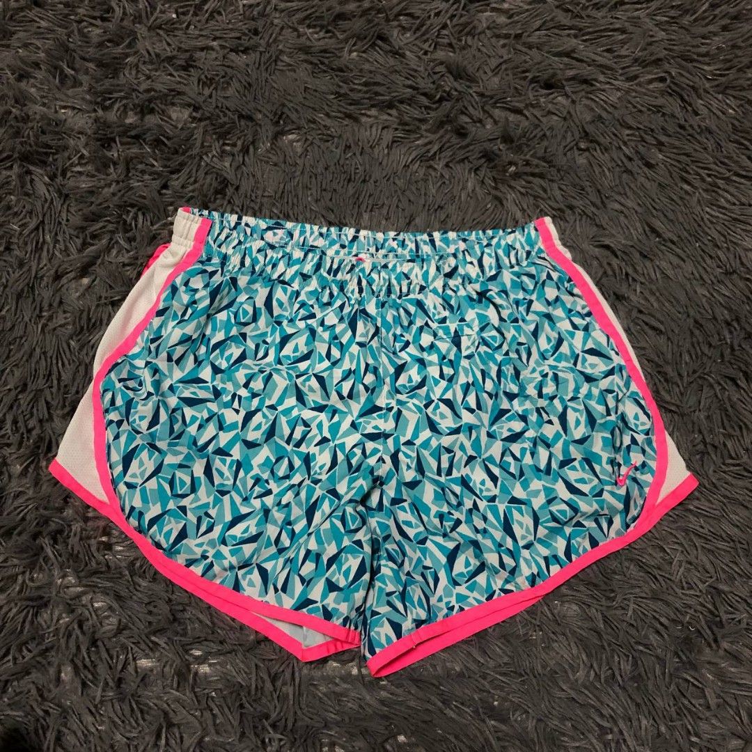 Nike Running Shorts (Category: Shorts) located in Camiling. Submitted by thriftscape2024 (Listing ID 1467552479, Image 1). Description: Excellent Condition Color rate: 9/10 Issue: ❌❌❌ W: Free L: 12 Thigh: 12 Leg Opening: 12.