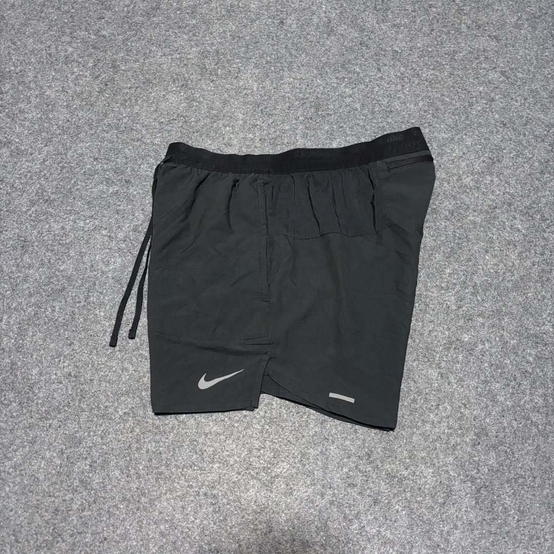 Nike Running Shorts DM4755-010 Size S (Category: Shorts) located in Cebu City. Submitted by andrewvivar29 (Listing ID 1467444366, Image 2). Description: - Brand: Nike - Item: Running Shorts - Color: Black - Size: Small (Model: DM4755-010) - Waistband: Elastic with drawstring closure - Pocket: Convenient zippered back pocket - Safety: Reflective logos for evening visibility - Material: Lightweight and sweat-wicking for dry comfort - Condition: Cle