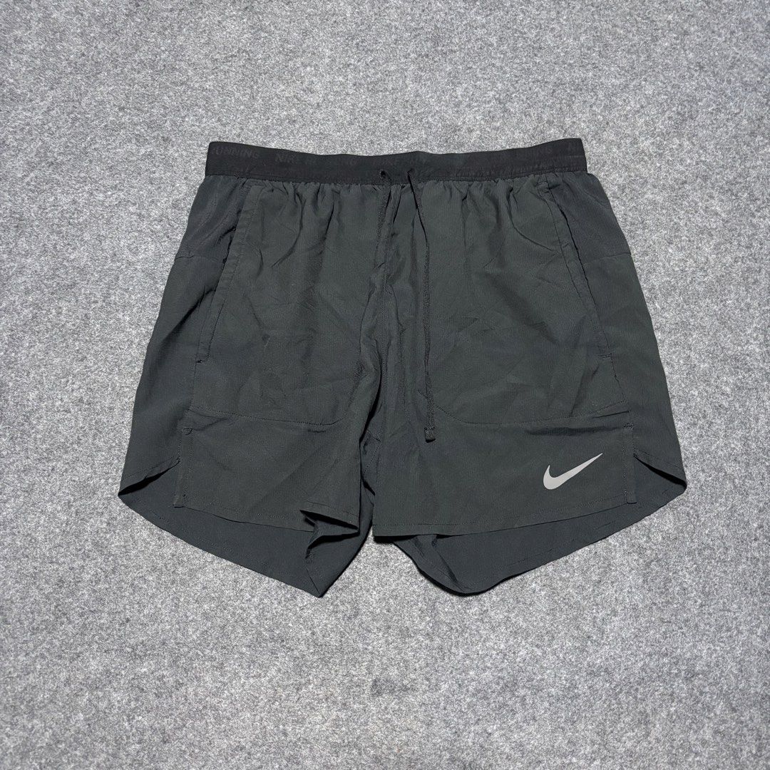 Nike Running Shorts DM4755-010 Size S (Category: Shorts) located in Cebu City. Submitted by andrewvivar29 (Listing ID 1467444366, Image 1). Description: - Brand: Nike - Item: Running Shorts - Color: Black - Size: Small (Model: DM4755-010) - Waistband: Elastic with drawstring closure - Pocket: Convenient zippered back pocket - Safety: Reflective logos for evening visibility - Material: Lightweight and sweat-wicking for dry comfort - Condition: Cle