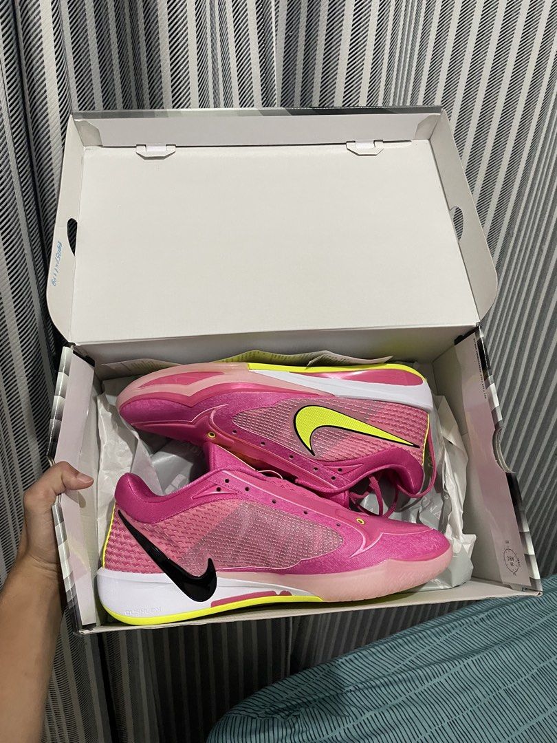 Nike Sabrina 4 “Dessert pink” (Category: Sneakers) located in San Pedro. Submitted by mharemilvalencia (Listing ID 1467537095, Image 2). Description: - Brand: Nike Sabrina 4 - Colorway: Bright pink and yellow with double-swoosh design - Condition: Like new, zero sole wear, clean uppers - Inclusions: Complete with original box - Features: Translucent forefoot overlay and high-traction outsole - Perfect for: Hoop sessions or casual wear - Shipping 