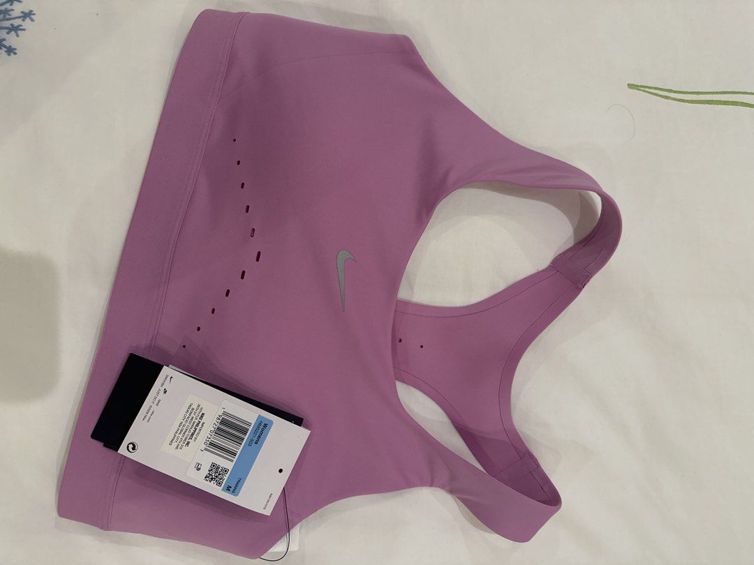 Nike Swift Bra in Light Magenta (Category: Activewear) located in Manila. Submitted by goodjuju_ (Listing ID 1467467288, Image 2). Description: Nike Swift High-Support Sports Bra - Color: Light Magenta - Size: Medium (M) (32C-32E, 34A-34C) - Condition: Brand new with original tags attached, never worn.
