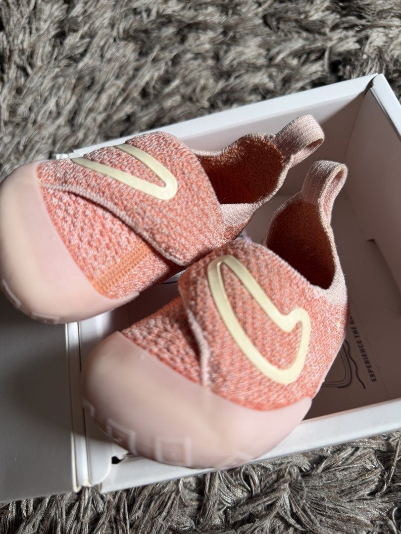 Nike Swoosh 1 Coral 5c (Category: Babies & Kids Fashion) located in Bulacan. Submitted by yogis1993 (Listing ID 1467407444, Image 2). Description: - Authentic pink Nike baby shoes - White Nike check branding on the top strap - Comfortable knitted upper with soft peach-pink rubber toe guard and outsole - Heel pull tab with lowercase nike text branding - Includes original box.