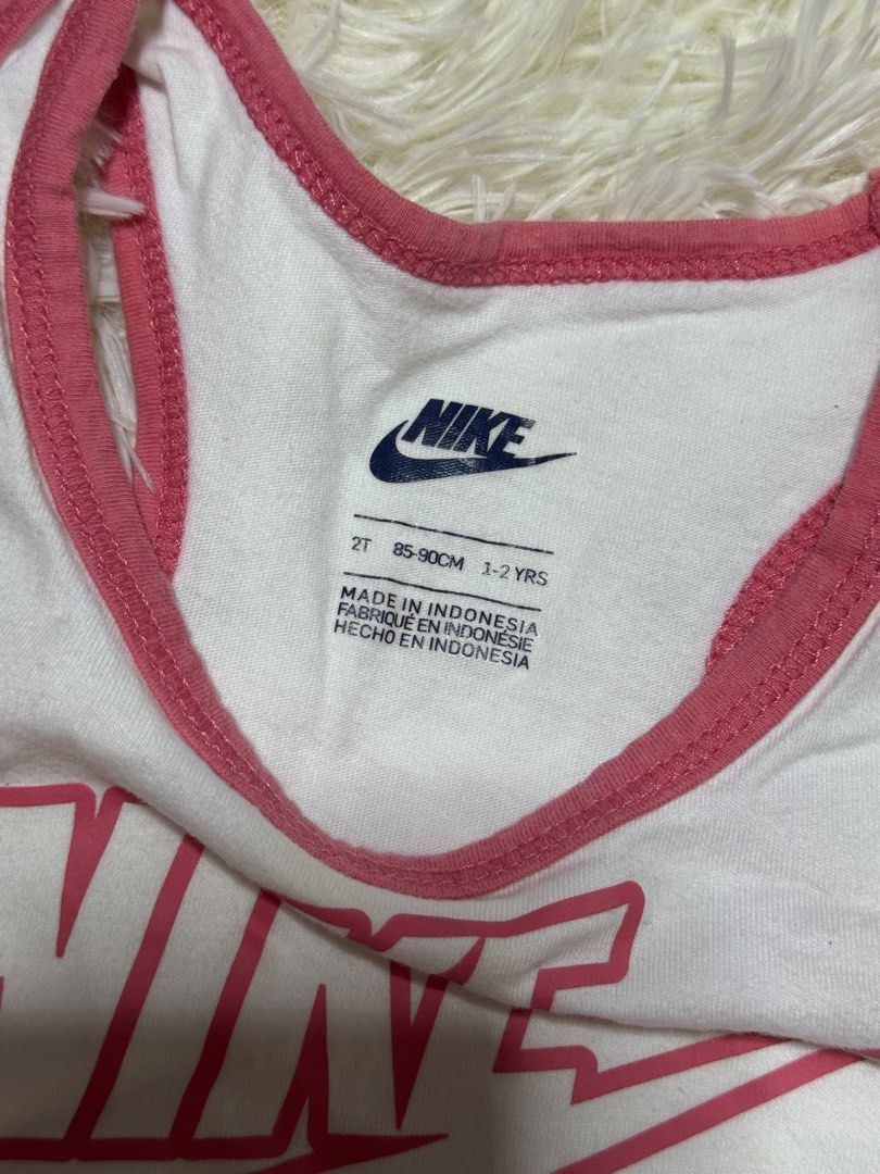 Nike Toddler Tank Top (Category: Babies & Kids Fashion) located in Dagupan City. Submitted by iamrannflores (Listing ID 1467409645, Image 2). Description: - Brand: Nike - Size: 2T (Fits ages 1-2 years / 85-90cm) - Design: White top section with pink Nike logo and swoosh, paired with a pink polka-dot bottom half - Details: Cute pink trim around the neckline and arm openings - Origin: Made in Indonesia - Condition: Brand new/ odličan quality (ready
