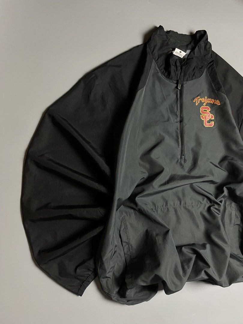 Nike Trojans Qzip Windbreaker two-tone (Category: Coats, Jackets and Outerwear) located in Cebu City. Submitted by covenanthrifts (Listing ID 1467374620, Image 2). Description: Very Good Condition Color Rate: 9/10 Size on tag: Large Issue: Small hole 🕳️ (See last Photo).