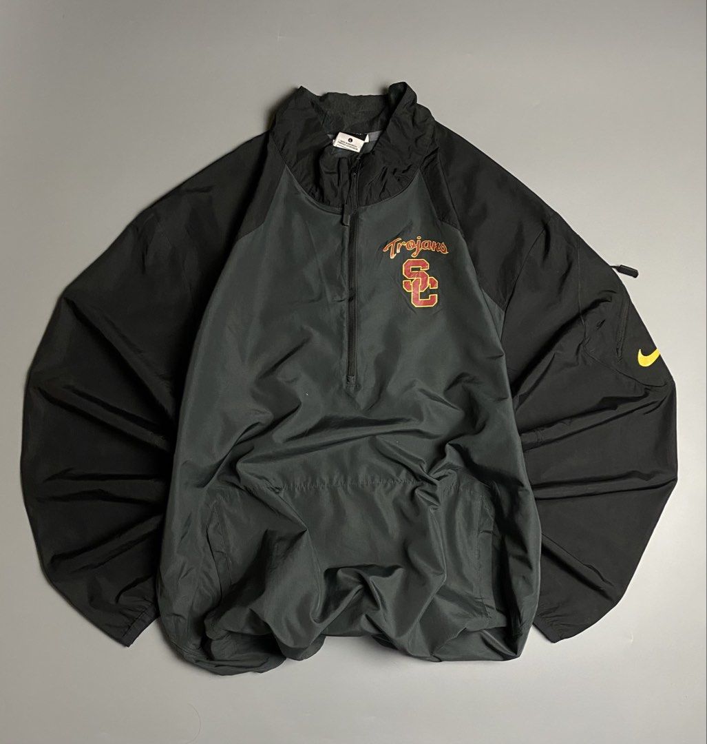 Nike Trojans Qzip Windbreaker two-tone (Category: Coats, Jackets and Outerwear) located in Cebu City. Submitted by covenanthrifts (Listing ID 1467374620, Image 1). Description: Very Good Condition Color Rate: 9/10 Size on tag: Large Issue: Small hole 🕳️ (See last Photo).