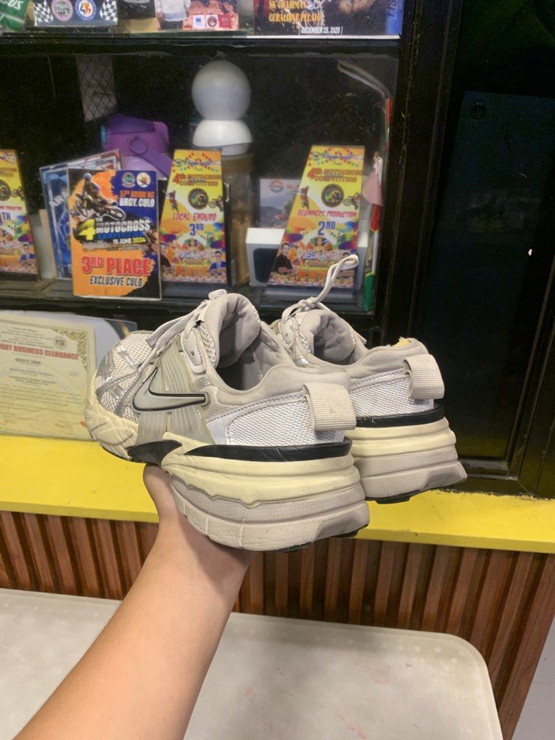 Nike V2K Run Metallic Silver Light Orewood Brown (Category: Sneakers) located in Molave. Submitted by mattjalamanadoromal323 (Listing ID 1467522026, Image 2). Description: - Model: Nike V2K Run - Colorway: Metallic Silver and Light Orewood Brown - Style: Chunky retro runner with black and white accents - Materials: Mesh and synthetic overlays - Condition: Pre-loved with dirt residue on the soles - Perfect for everyday streetwear and Y2K aesthetic