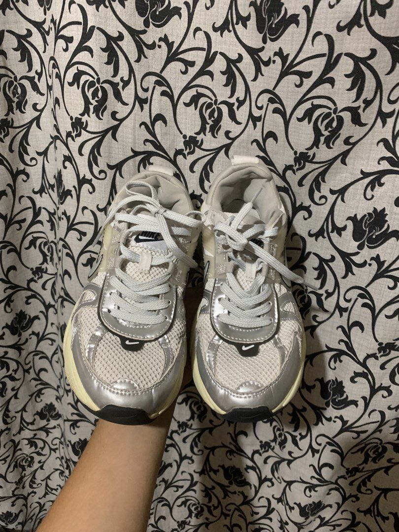 Nike V2K Run Silver Metallic Summit White Shoes (Category: Sneakers) located in Molave. Submitted by mattjalamanadoromal323 (Listing ID 1467523086, Image 2). Description: - Model: Nike V2K Run - Colorway: Metallic Silver and Summit White - Style: Chunky midsole, breathable mesh upper with synthetic overlays, and signature Swoosh branding - Condition: Worn a few times, soles have minor dirt from normal outdoor walking - Features: Super comfortable