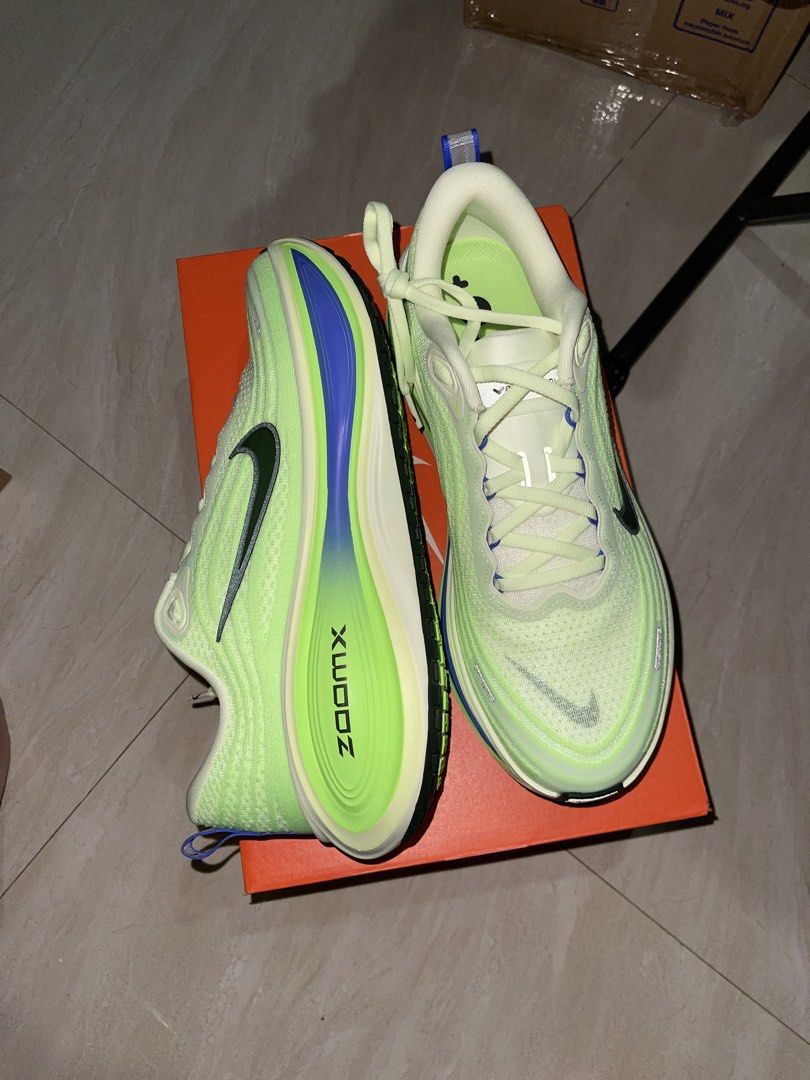 Nike Vomero Plus (Category: Sneakers) located in Manila. Submitted by liveflower_6bf945 (Listing ID 1467517853, Image 2). Description: - Brand: Nike - Model: Vomero Plus - Color: Bright lime green with blue gradient midsole - Sole: Thick cushioned ZoomX foam with black rubber outsole for great grip - Condition: Brand new, never worn, pristine condition - Inclusions: Original orange Nike shoebox pwede lalamove or j&t, shoulder ng buyer negotiable 