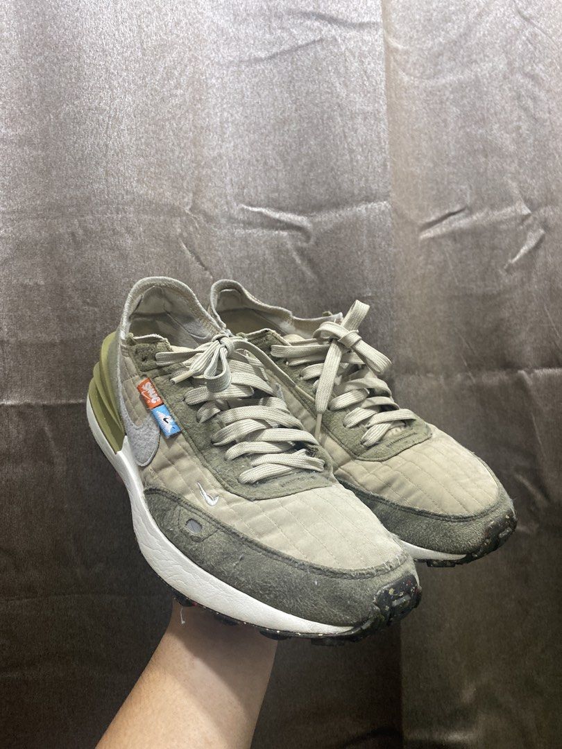 Nike Waffle One SE Olive Green Beige (Category: Sneakers) located in Manila. Submitted by cyyruss (Listing ID 1467427928, Image 1). Description: - Brand/Model: Nike Waffle One - Colorway: Olive green and beige - Materials: Quilted textile upper with suede overlays - Features: Standard lace-up closure, distinct olive heel clip, white midsole, dark waffle traction outsole, and orange/blue branding tags - Fast shipping.