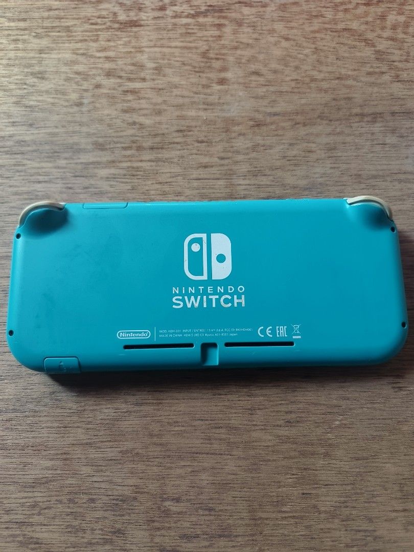 Nintendo Switch Lite Turquoise with Dobe Carry Case (Category: Nintendo) located in Subic. Submitted by tamaresjoh78671 (Listing ID 1467366918, Image 3). Description: Fs Switch Lite Console only(with case) Not Jailbreak No Sd card Condition - 8/10 Issue: May konting signs of usage pero working na working at walang depekto sa performance o laro Pwede meetup Olongapo area Pwede rin LBC Price still negotiable.