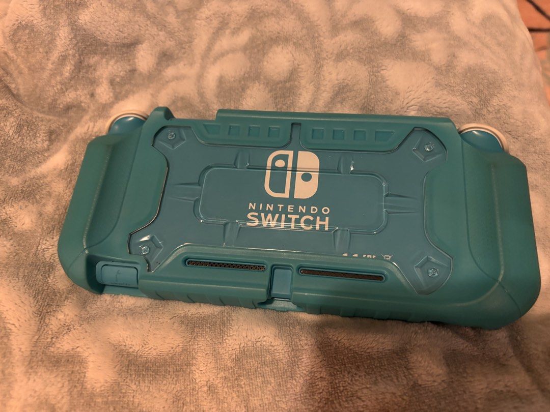 Nintendo Switch Lite Turquoise with Protective Case (Category: Nintendo) located in Cebu City. Submitted by citygirl829 (Listing ID 1467420265, Image 2). Description: - Color: Turquoise - Condition: Excellent, kept in a matching teal rubber case since day one - Display & Controls: Clean screen, fully intact and responsive buttons/joysticks - Portability: Compact handheld console, perfect for on-the-go gaming - Inclusions: Comes with original char
