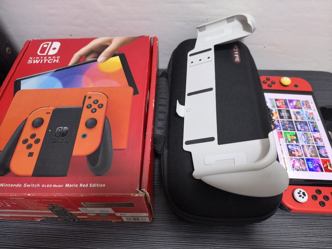 Nintendo Switch OLED Mario Red Edition (Category: Nintendo) located in Valenzuela. Submitted by eb11042019 (Listing ID 1467437511, Image 1). Description: HELPING A RELATIVE PO PINA POST SAAKIN. FOR SALE PRE-OWNED NINTENDO SWITCH OLED MARIO RED EDITION JAILBREAK 256GB. 13,000 last price posted na po. With many games ready to play na po. With box and complete accessories. Dock, HDMI Cable, Grip, Straps, Original charger, Tempered, Box. Free thumb g