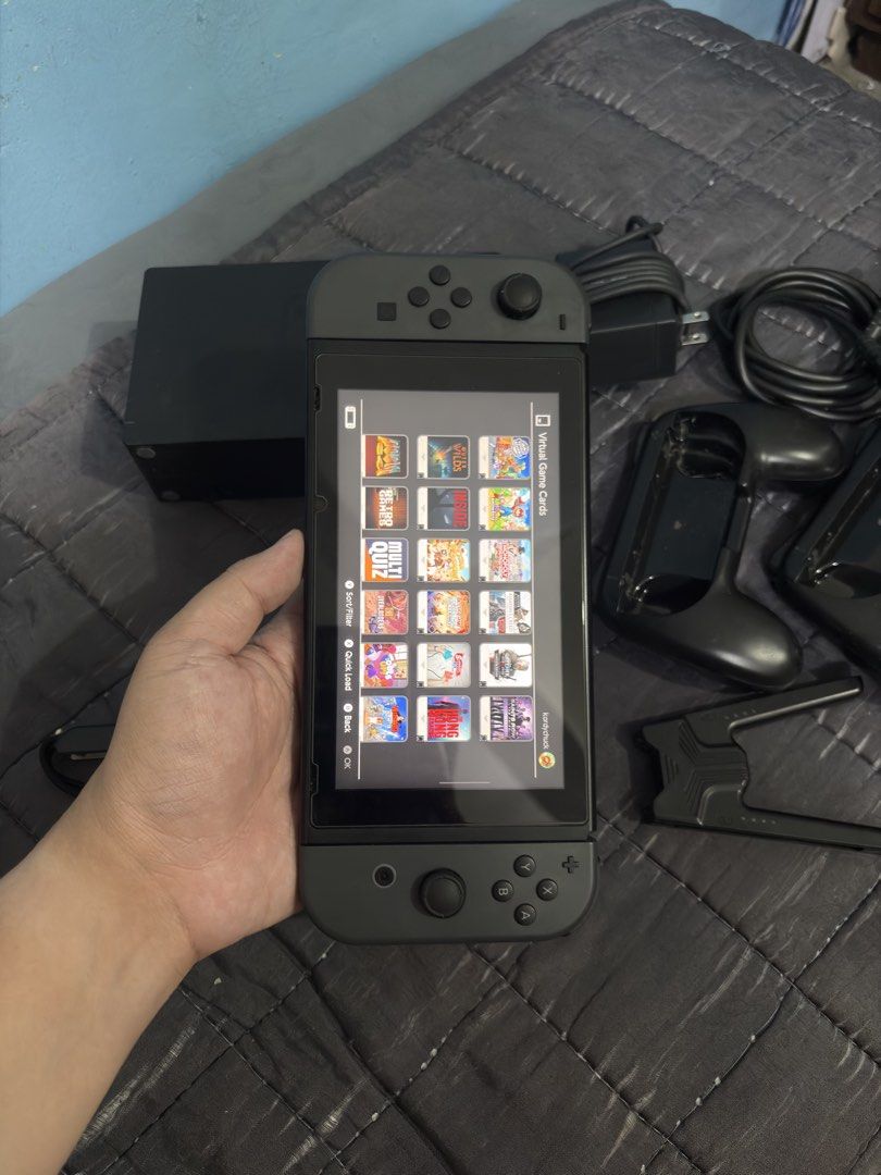 Nintendo Switch V2 with 125 Digital Games (Category: Nintendo) located in Cavite. Submitted by xsavier88 (Listing ID 1467535522, Image 2). Description: 🌟For sale for sale! Nintendo Switch V2 with 125 Digital Games 8,000 PHP 8,000 PHP 8,000 PHP 🌟INCLUSIONS: Complete accessories 125 Digital Games (Check the attached images for the list of games) 🌟ADD-ONS: Sandisk 256GB Memory Card - 2,200 Sandisk 128GN Memory Card - 1,200 🌟Cavite area. Open for