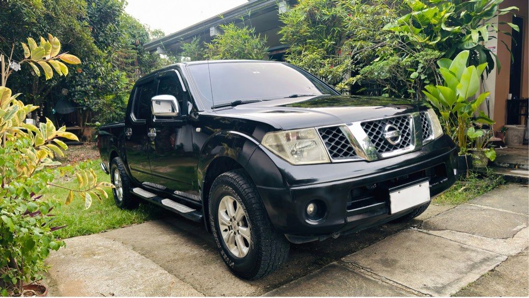 Nissan Navara D40 Auto (Category: Used Cars) located in Batangas. Submitted by Rnzzz (Listing ID 1467494433, Image 2). Description: For Sale 2009 Nissan Navara LE White Plate Cold A/C Upgraded Head unit (Apple Carplay & Android Auto) Leather Seats 5D matting Bed cover Thick Tires & Upgraded rims Newly Changed Oil Newly Flushed Coolant (Preston coolant) Newly cleaned EGR New turbo hose New fuel filter New fan belt & compressor belt New brake shoe 