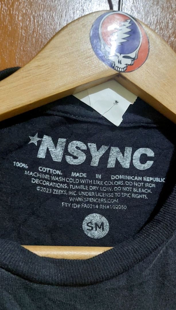 NSINC No Strings Attached Band T-Shirt Small (Category: Tshirts & Polo Shirts ) located in Legazpi City. Submitted by street_uniform (Listing ID 1467401738, Image 3). Description: - Dimes: W18.5 L26 - Brand: Official NSYNC merchandise from Spencer's (2023) - Design: Front graphic print with all five band members on stage and bold band logo - Size: Small (SM) - Material: 100% cotton, made in Dominican Republic - Fit: Regular fit with standard crew