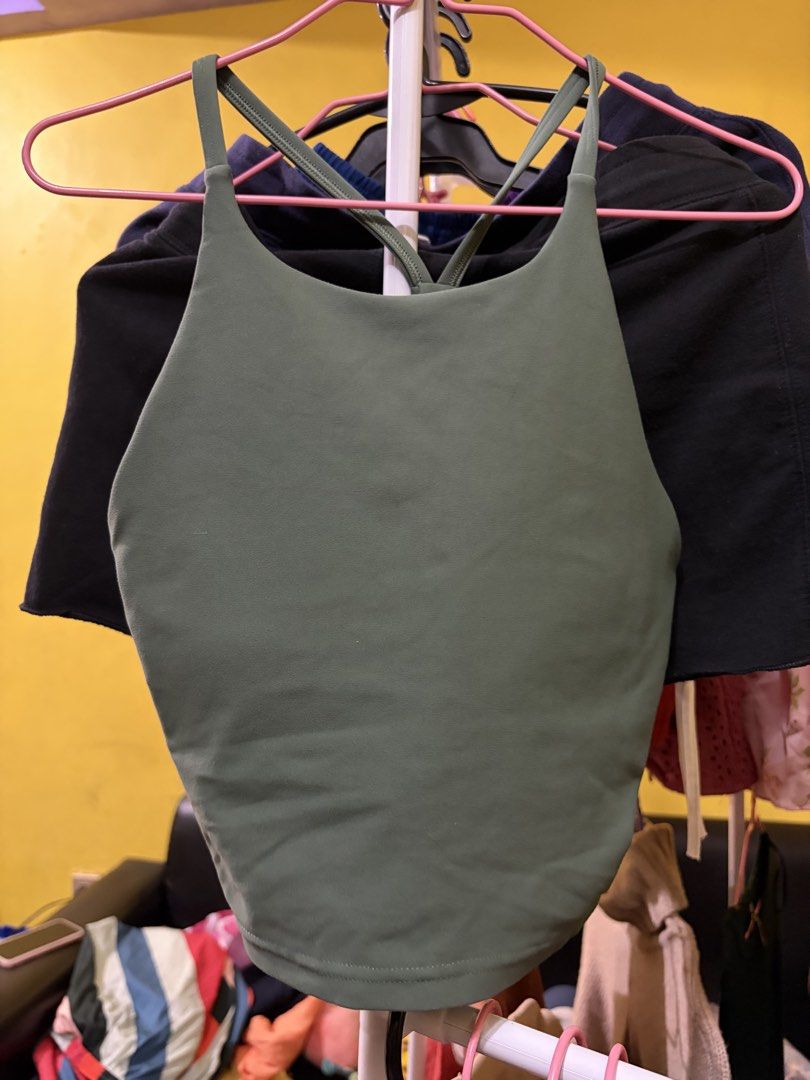 Old Navy Active Powersoft Tank Top XS (Category: Activewear) located in Calamba. Submitted by handpickedbynetty (Listing ID 1467385949, Image 1). Description: - Brand: Old Navy Active - Style: Powersoft tank top with strappy back - Color: Sage green - Size: XS - Features: Built-in bra with light support, super soft fabric - Ideal for: Workouts, yoga, or everyday activewear -Padded.
