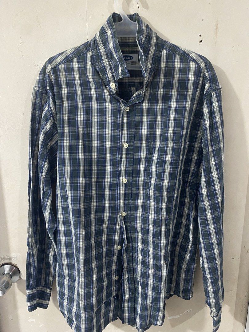 Old Navy Plaid Long Sleeve Button Down Shirt Medium (Category: Tshirts & Polo Shirts ) located in Imus. Submitted by just.randoms (Listing ID 1467557093, Image 1). Description: - Brand: Old Navy - Size: Medium - Color/Pattern: Blue, green, and white plaid - Material: 100% cotton - Details: Long sleeves with button cuffs, single left chest pocket, vintage Hong Kong manufacturing tag - Condition/Style: Classic casual piece, great for everyday wear.